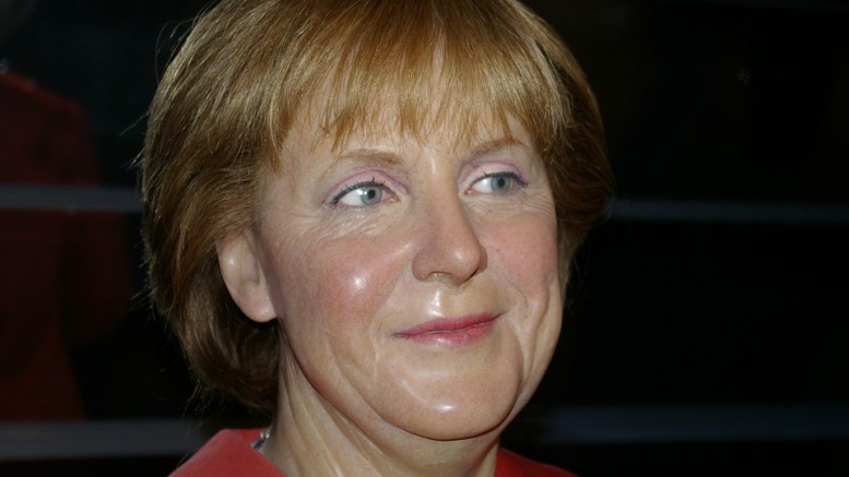 Merkel backs migrant surge, says Germany fights terrorism with compassion